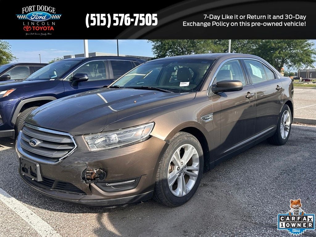 2015 Ford Taurus SEL in Caribou Metallic — front three-quarter view