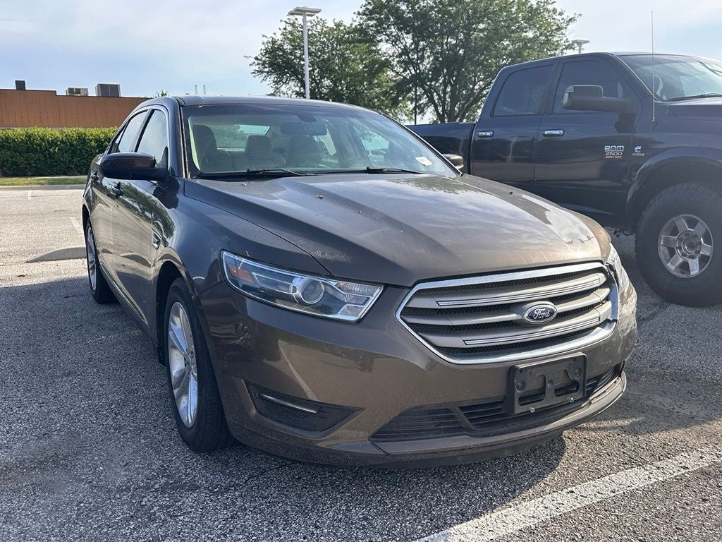 2015 Ford Taurus — rear three-quarter view
