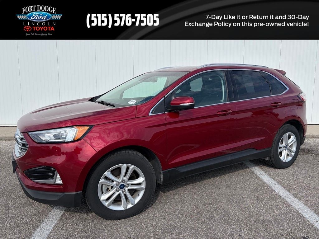 2019 Ford Edge SEL in Ruby Red Metallic — front three-quarter view