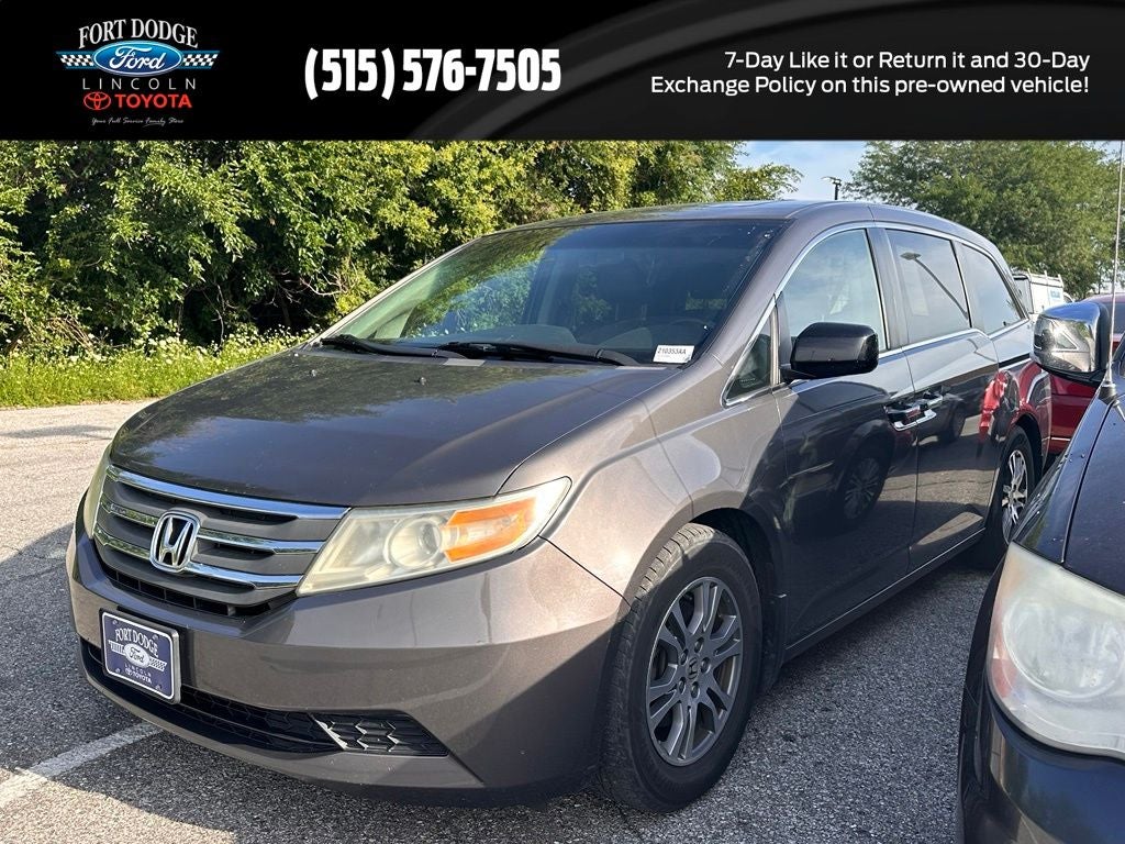 2012 Honda Odyssey EX-L in Polished Metal Metallic — front three-quarter view