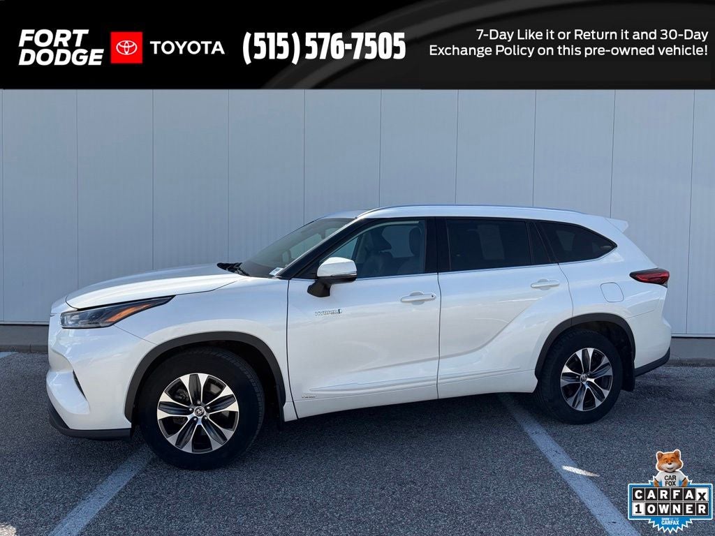 2021 Toyota Highlander Hybrid XLE in Blizzard Pearl — front three-quarter view